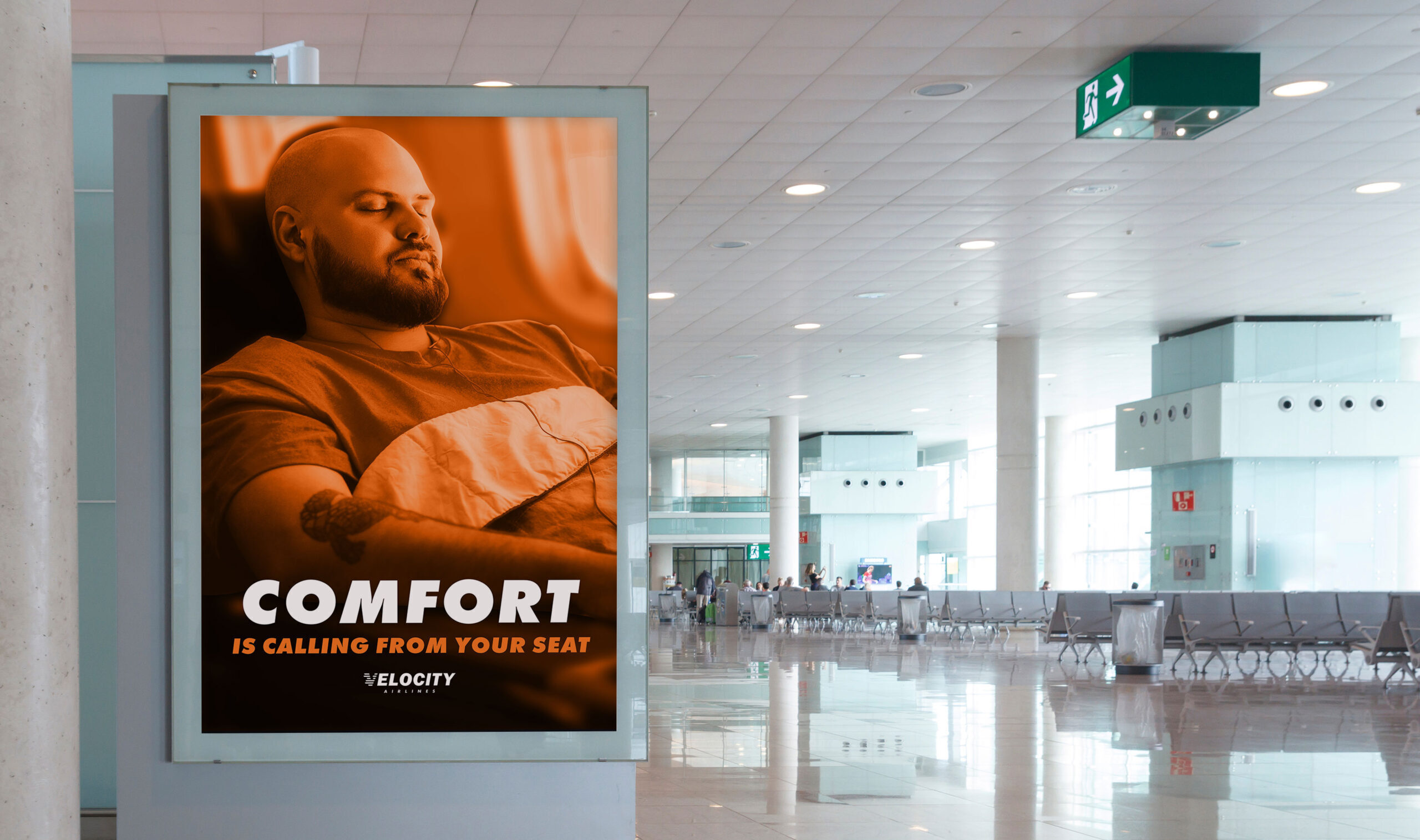 Ad-1 Airport advertisement, in airport screen, stating "Comfort is calling from your seat."